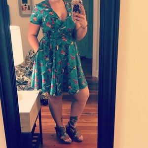Green wrap dress with birds